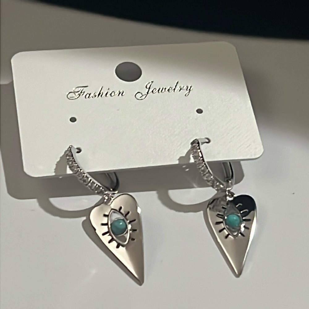 Silver heart evil eye crystal embellished earrings latch hoop style nwt